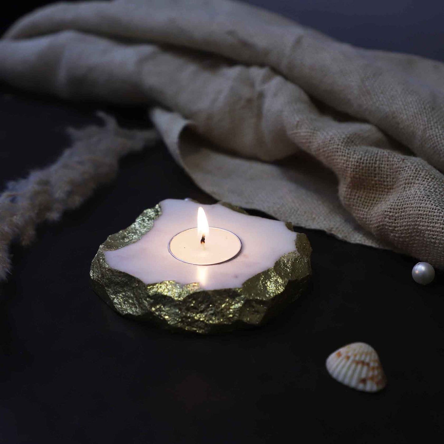 handmade marble candle holder with gold foiling made by artisans in India