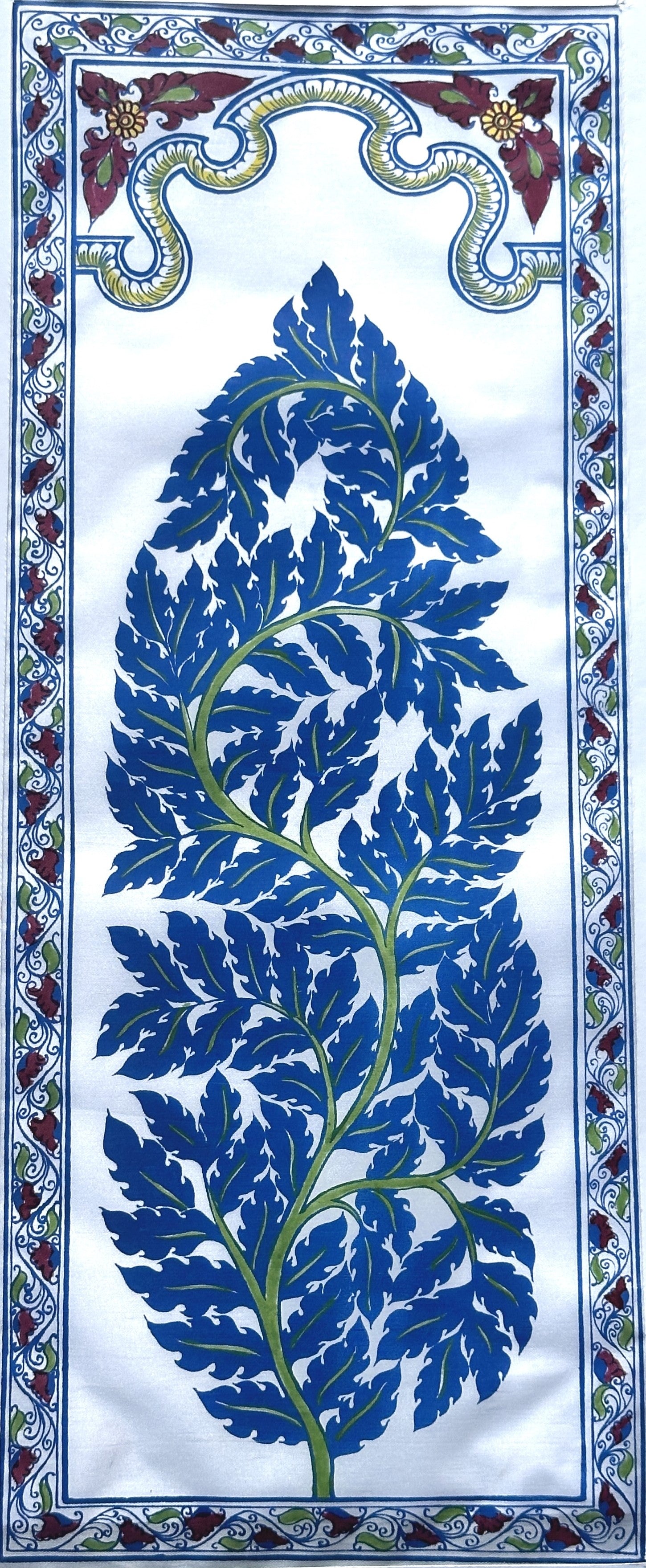 Hand-painted traditional artwork depicting "tree of life" in a vibrant blue color made on silk cloth by artisans in East India