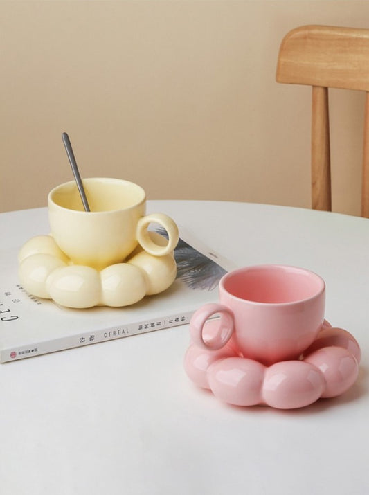 Colorful porcelain beverage cups with unique puffed saucers handmade by artisans in India